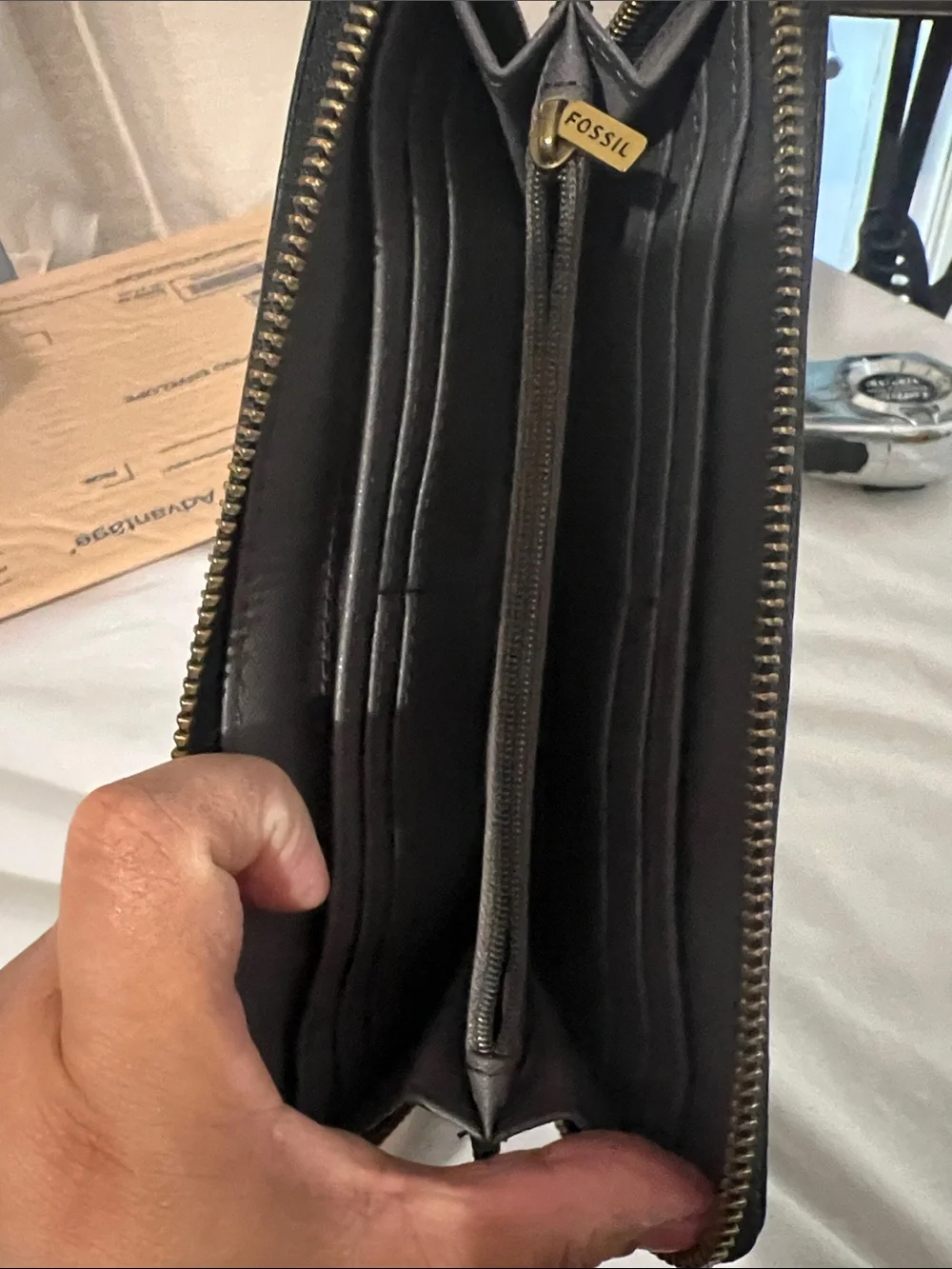 Fossil Black Leather Wristlet Wallet with Pink Tassel Charm